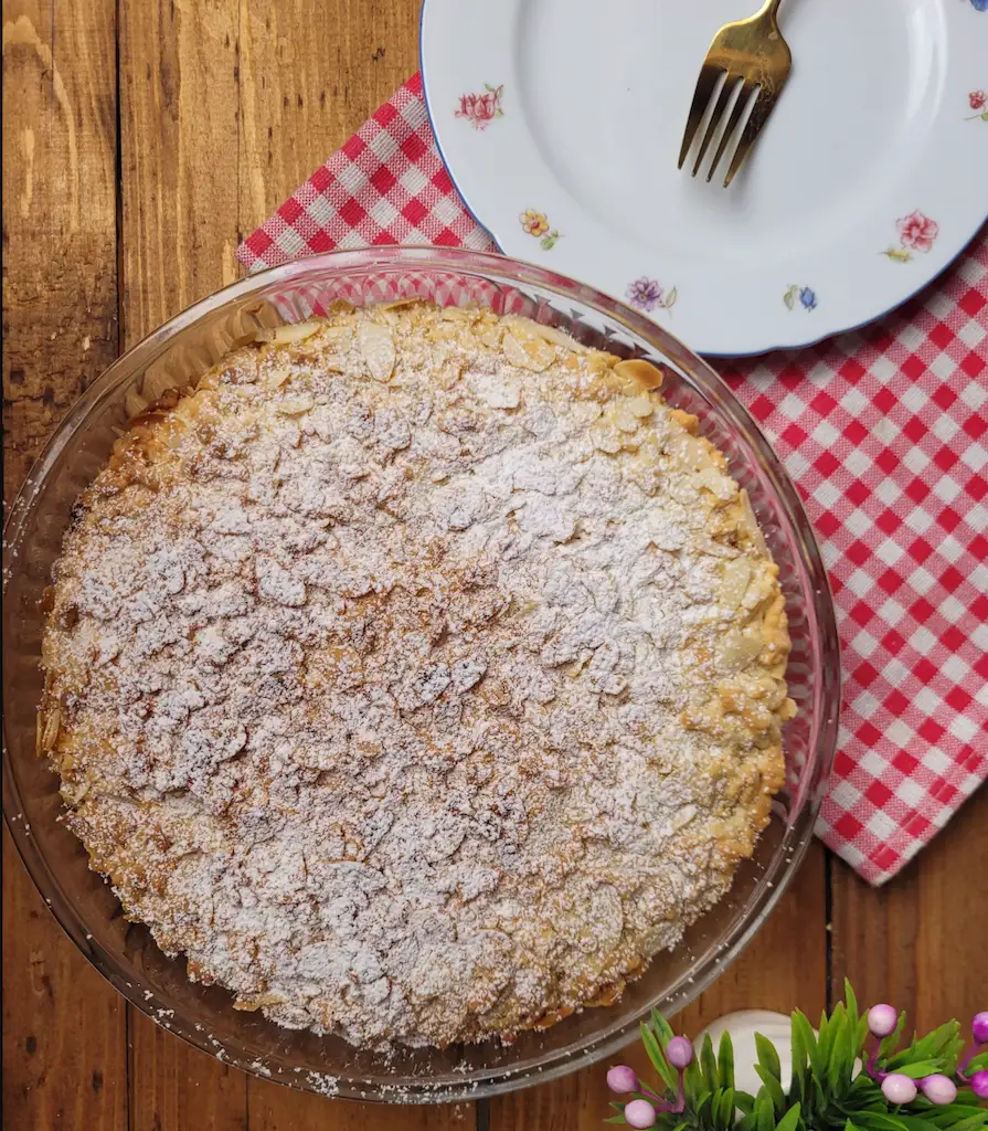 Tarta de Santiago almond cake with the Cross of Santiago stencilled in icing sugar