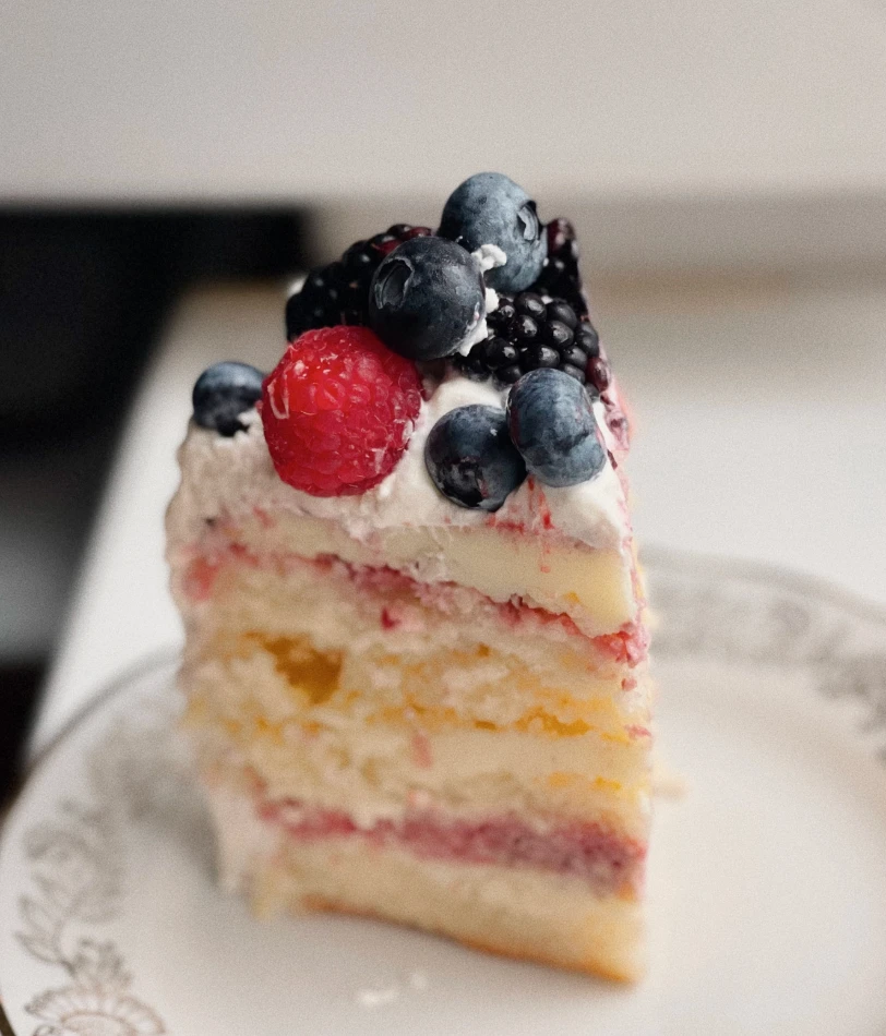 Chantilly cake topped with fresh berries