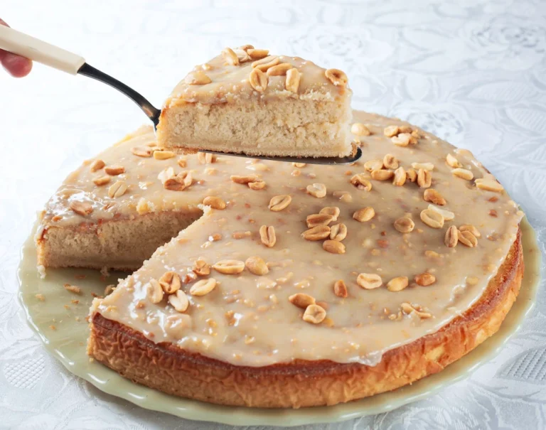 Southern caramel cake with thick cooked caramel frosting on top and sides
