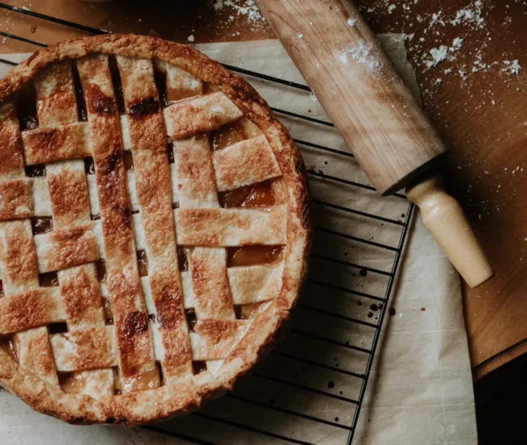 Classic apple pie with golden shortcrust pastry and crimped edges