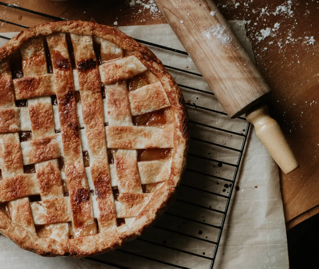 Classic apple pie with golden shortcrust pastry and crimped edges