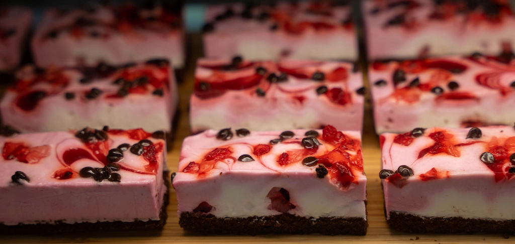 Colorful jello poke cake slice
