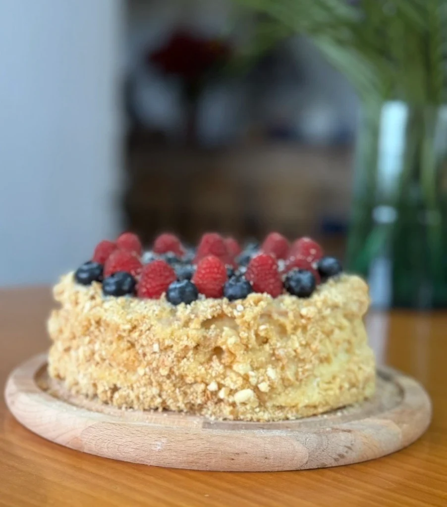 Classic Napoleon cake showing thin flaky pastry layers with custard cream