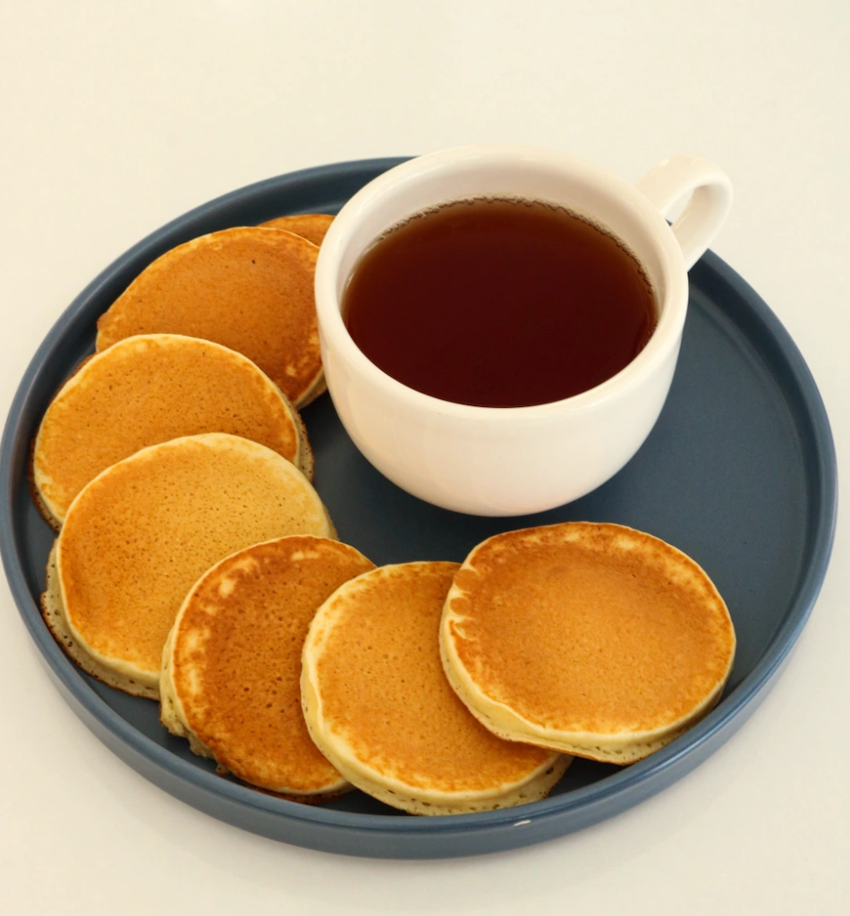 Southern hoecakes with crispy edges and a golden cornmeal colour